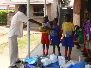 Teacher-giving-out-gifts